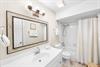 Freshen up in style Shower and tub combo in this upstairs bath with access from the hall and the double queen bedroom.