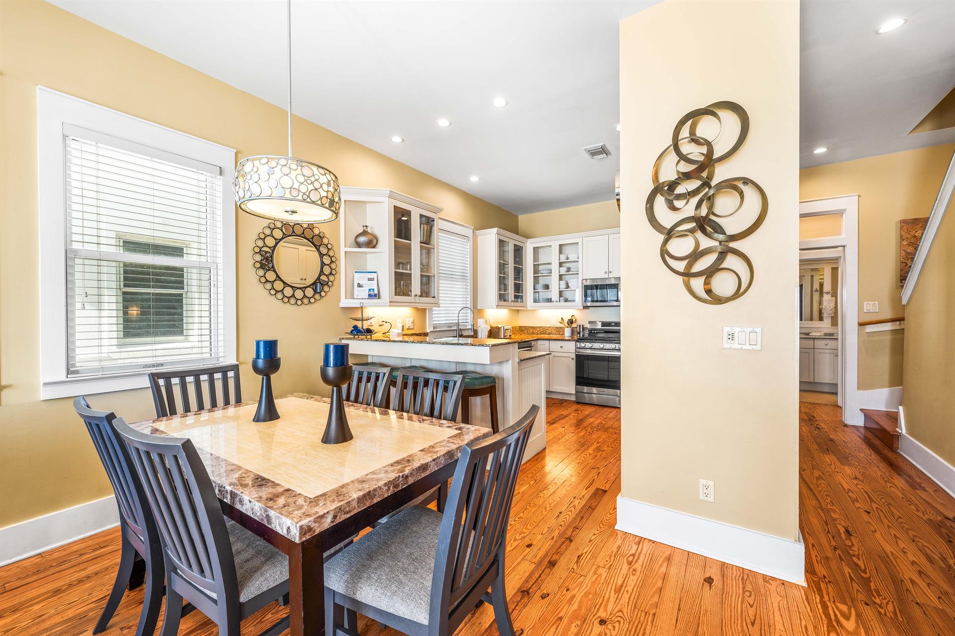 Dining Area and Hallway leading to 2nd floor bathroom and bedroom