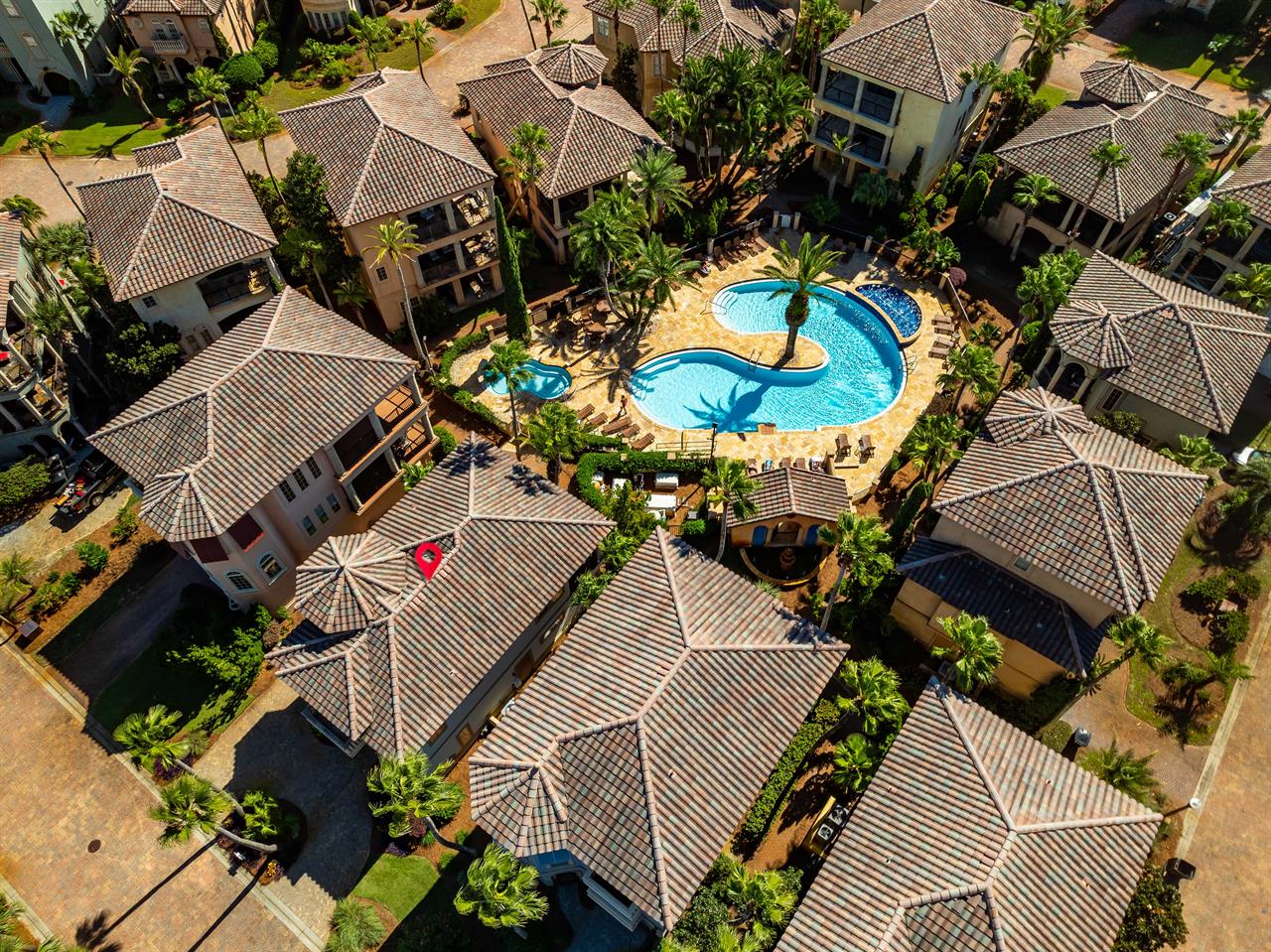 The impressive lagoon style pool is the centerpiece of the exclusive St. Tropez private gated community..