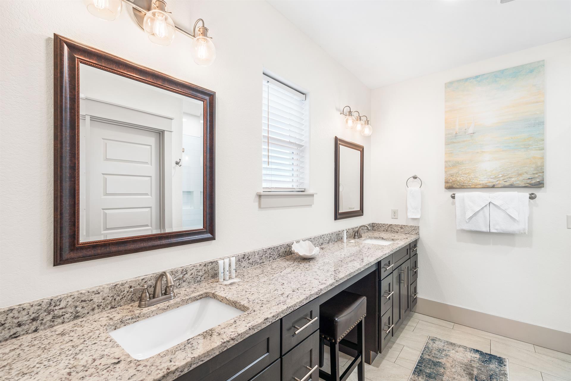 Primary en suite with double sinks  vanity seating