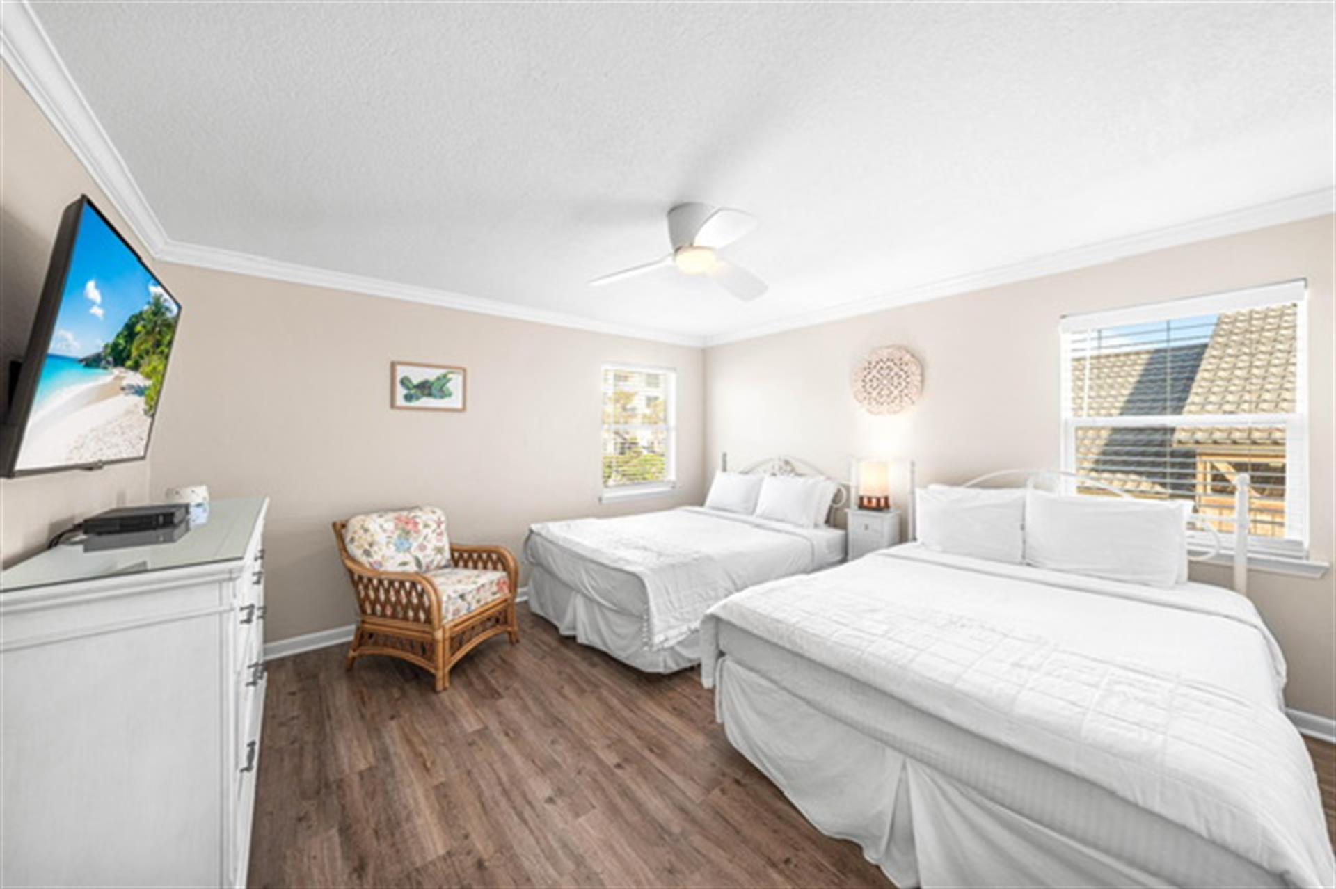 Double the queen beds, double the comfort, and a smart TV to keep you entertained all night long in this 2nd floor guest bedroom