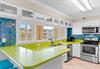 Vibrant Kitchen with Beach Views and Bar Seating