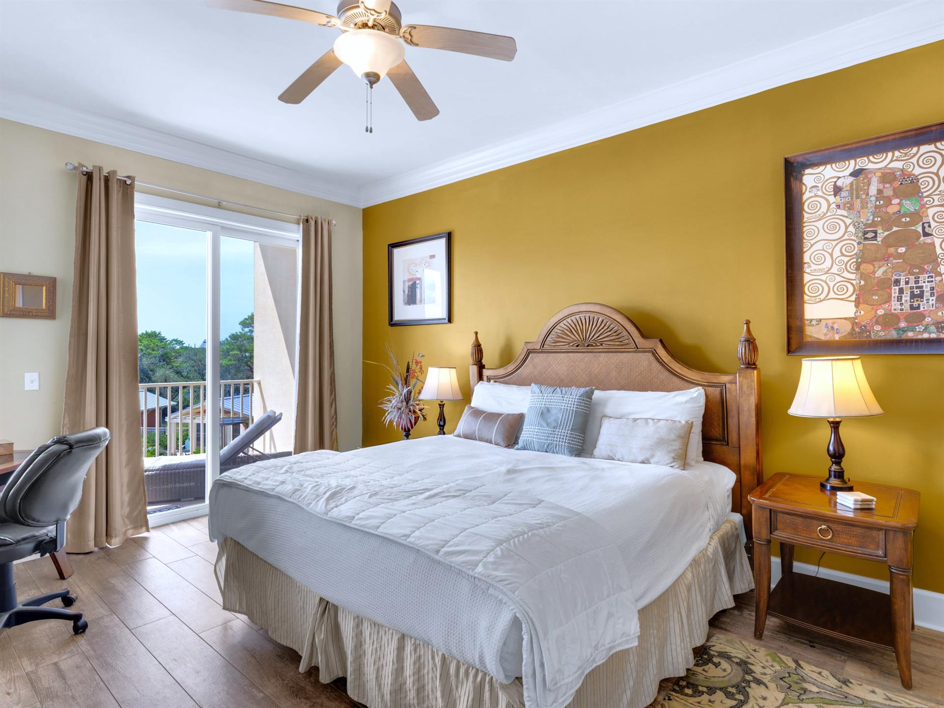 Primary Bedroom with King Bed and Balcony Access