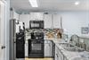 Kitchen Open to Dining and Living Areas