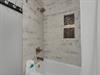 Tub Shower Combo in Front Guest Bathroom