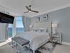 Primary Bedroom with King Bed and Balcony Access