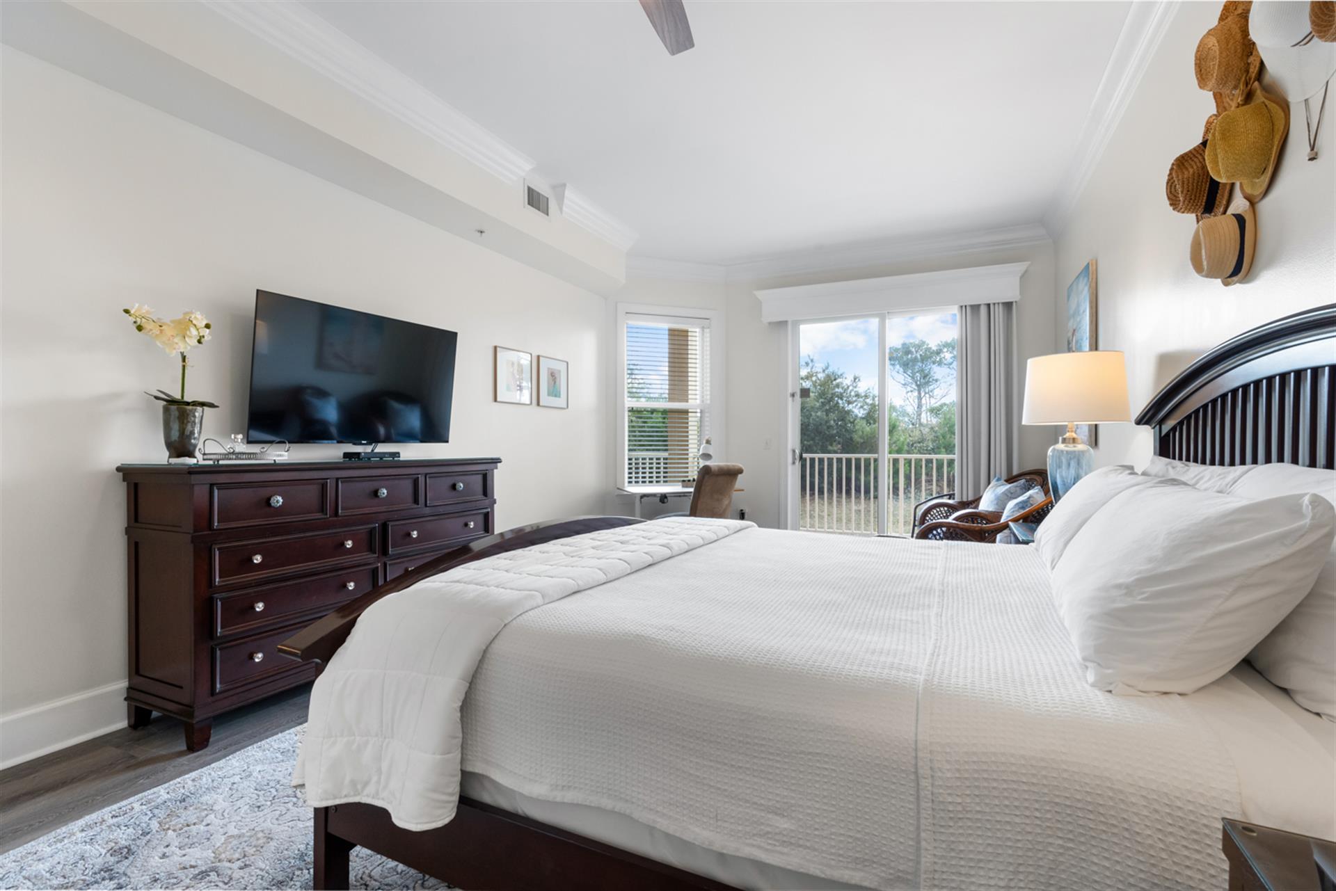 Primary bedroom with balcony access