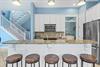 Kitchen with additional breakfast bar seating