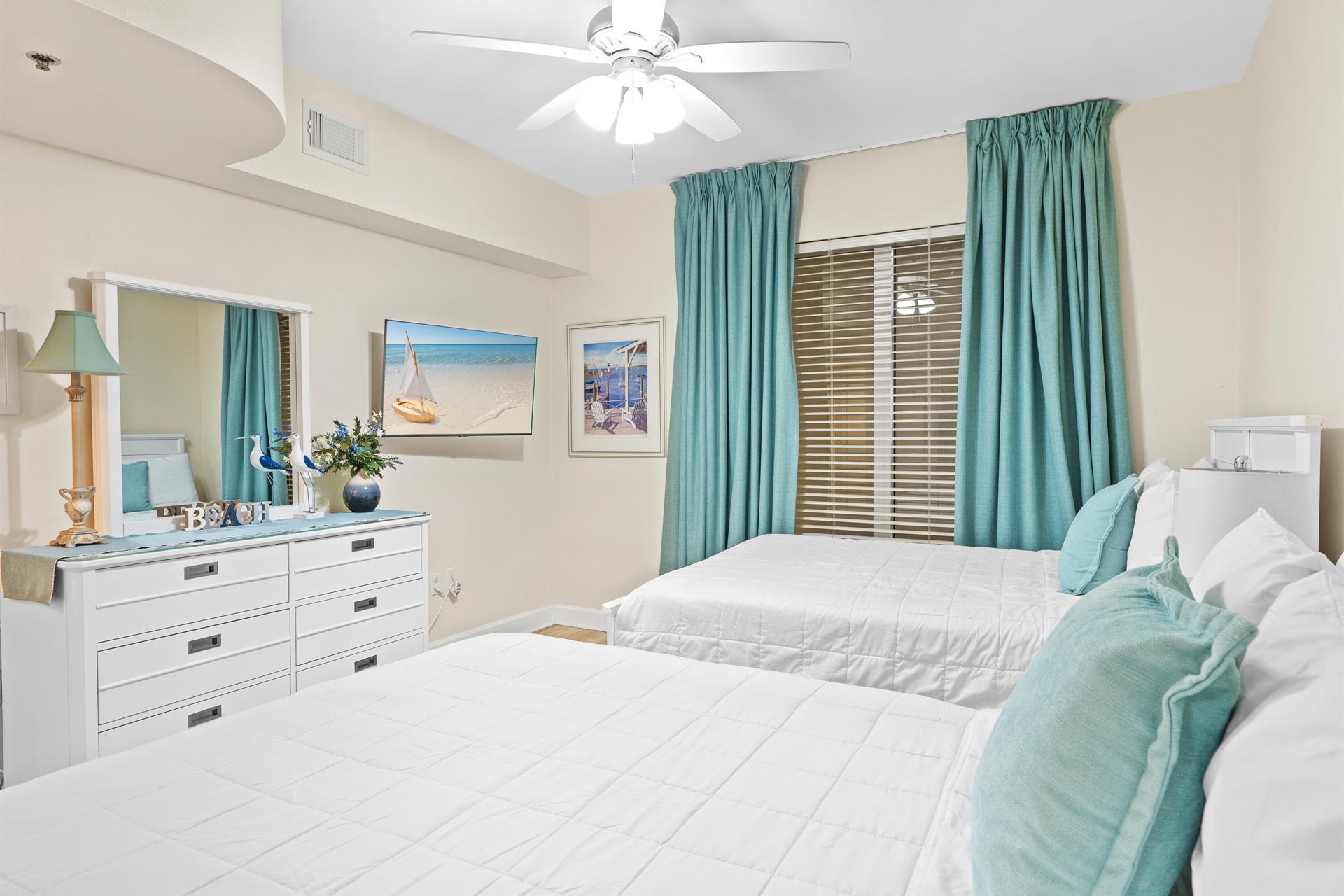 Guest Bedroom with Mounted TV