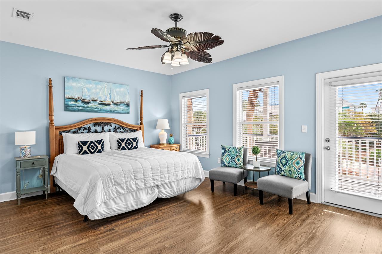 Second floor Primary Bedroom with seating and Private Balcony Access