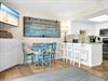 Dining area with breakfast bar seating