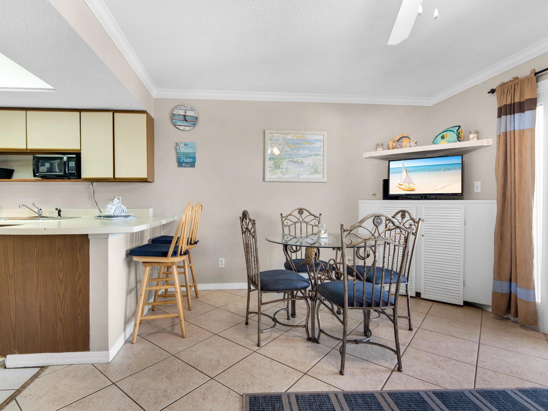 Dining area with additional breakfast bar seating