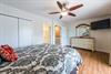 Primary Bedroom on 2nd Floor with Queen Bed and Flat Screen TV