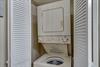 Stackable Washer and Dryer in Hall Bathroom