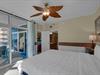 Primary Bedroom with King Bed and Balcony Access