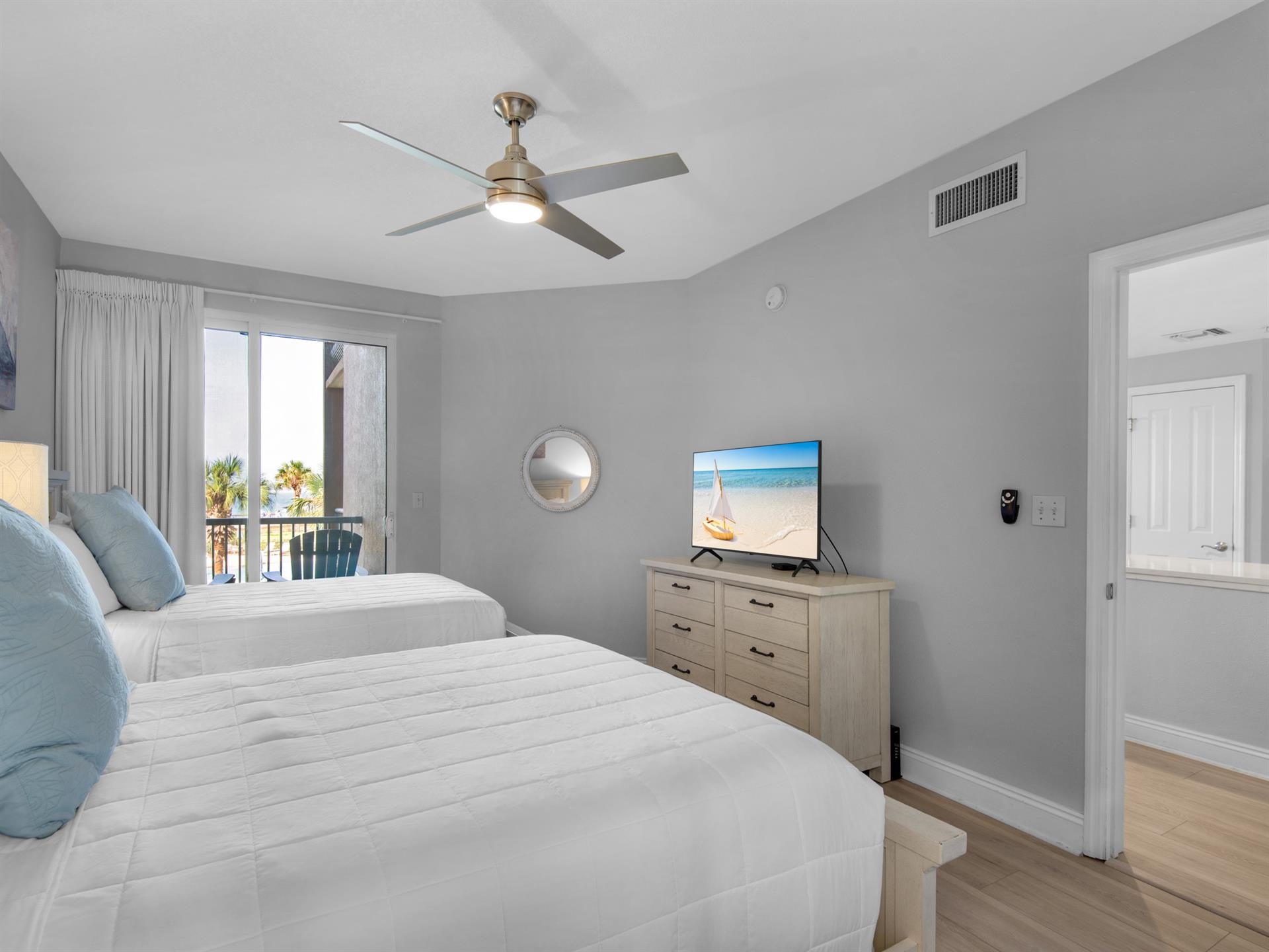 TV and Private Patio Access in Bedroom 2