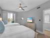 TV and Private Patio Access in Bedroom 2