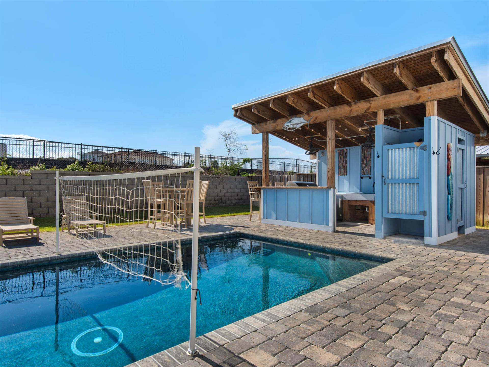Family fun in the pool and tiki area