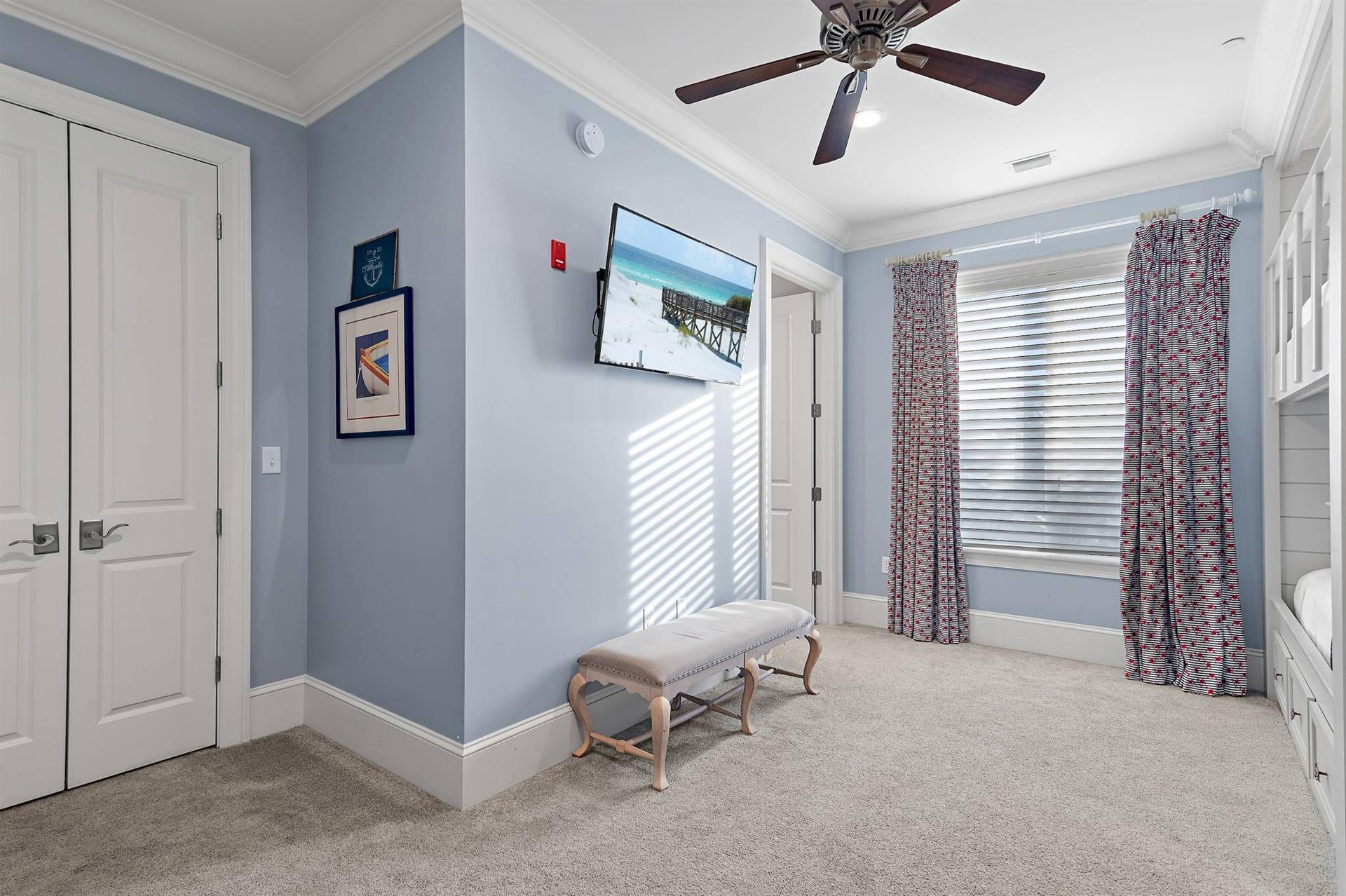Bedroom 5 with 2 Double over Double Bunk Beds and Flat Screen TV