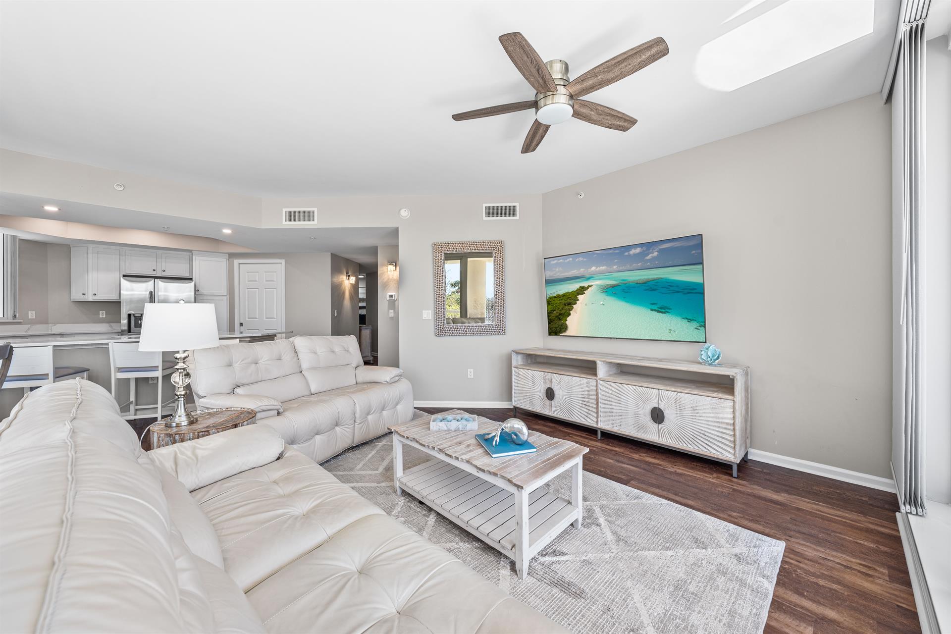 Large Open Living Room with Reclining Leather Chairs