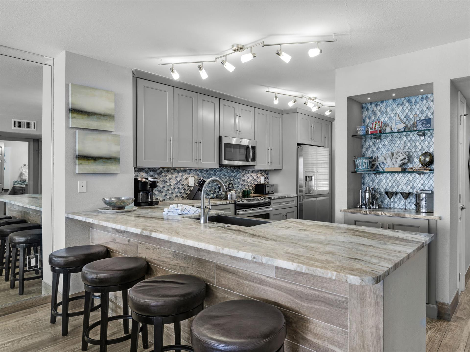 Beautifully Designed Kitchen with Stainless Steel Appliances