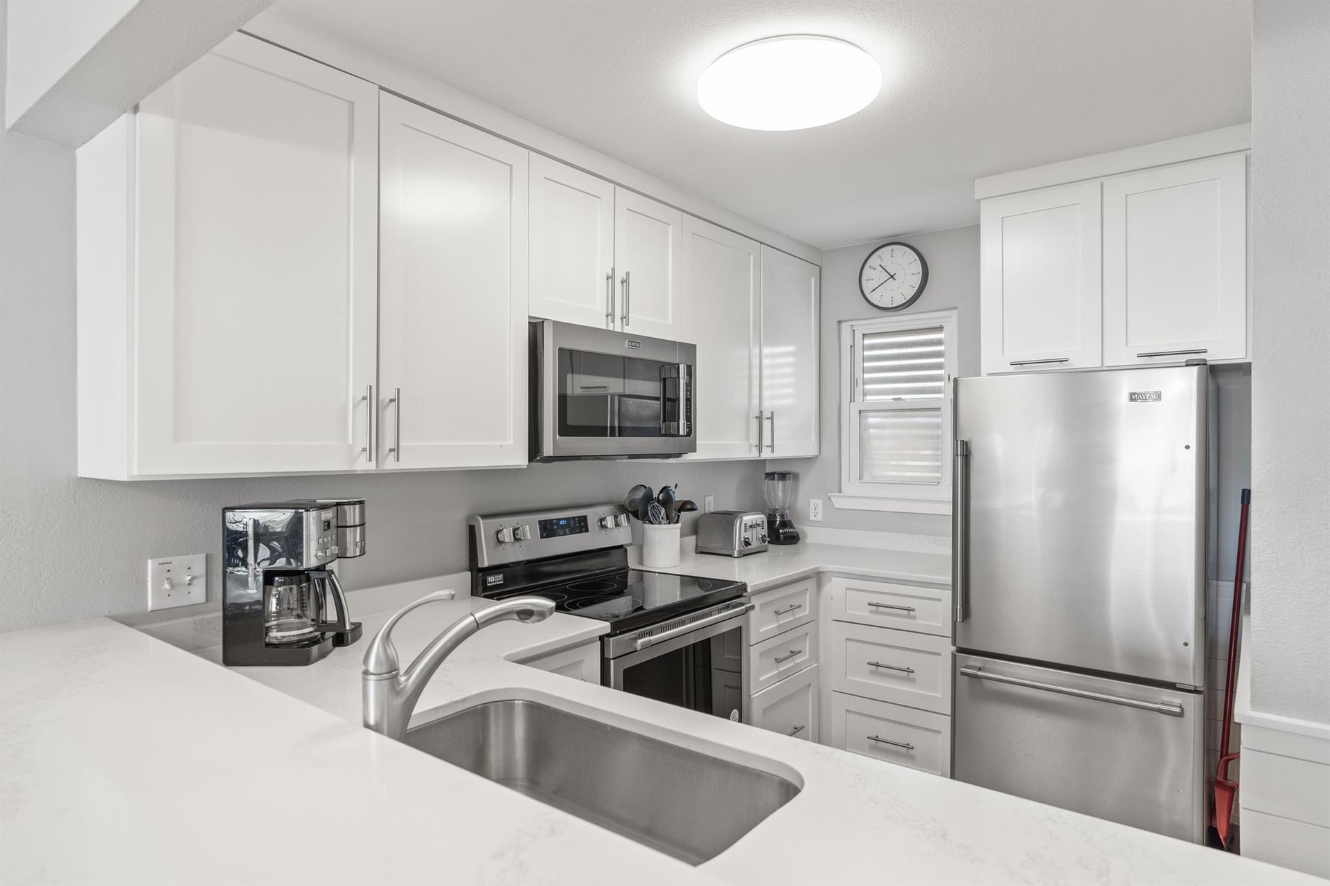 Fully Equipped Kitchen with Stainless Steel Appliances