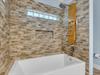Primary Bathroom on Main Floor with Rain Shower Head