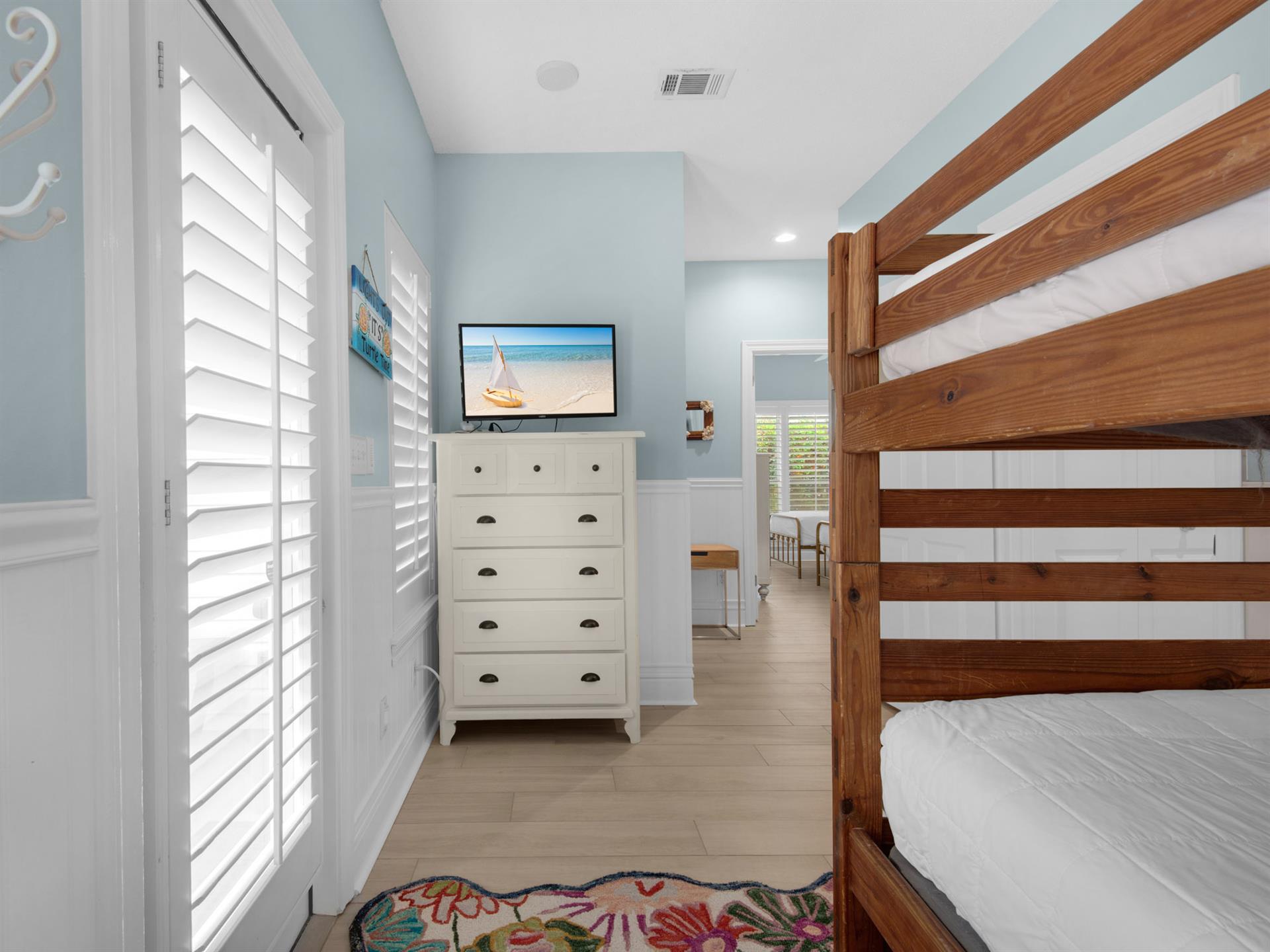 Bunk Bed Sleeping Space with TV