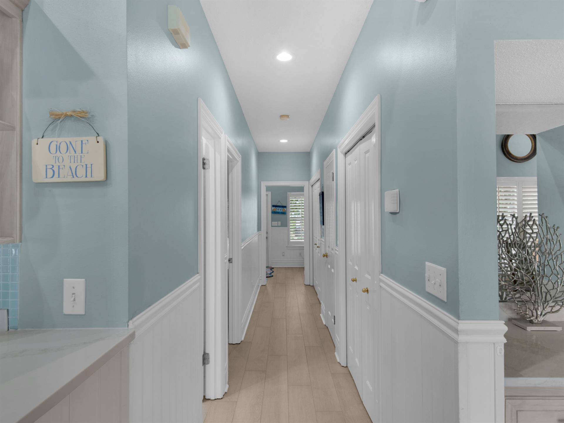 Hallway from Living Area to Bedrooms and Back Porch