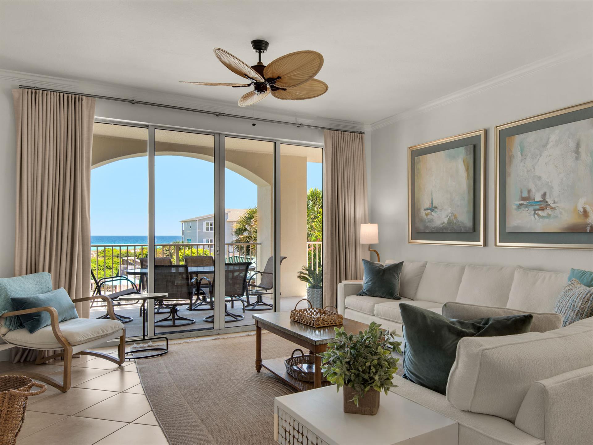 Living area with balcony access and Gulf views