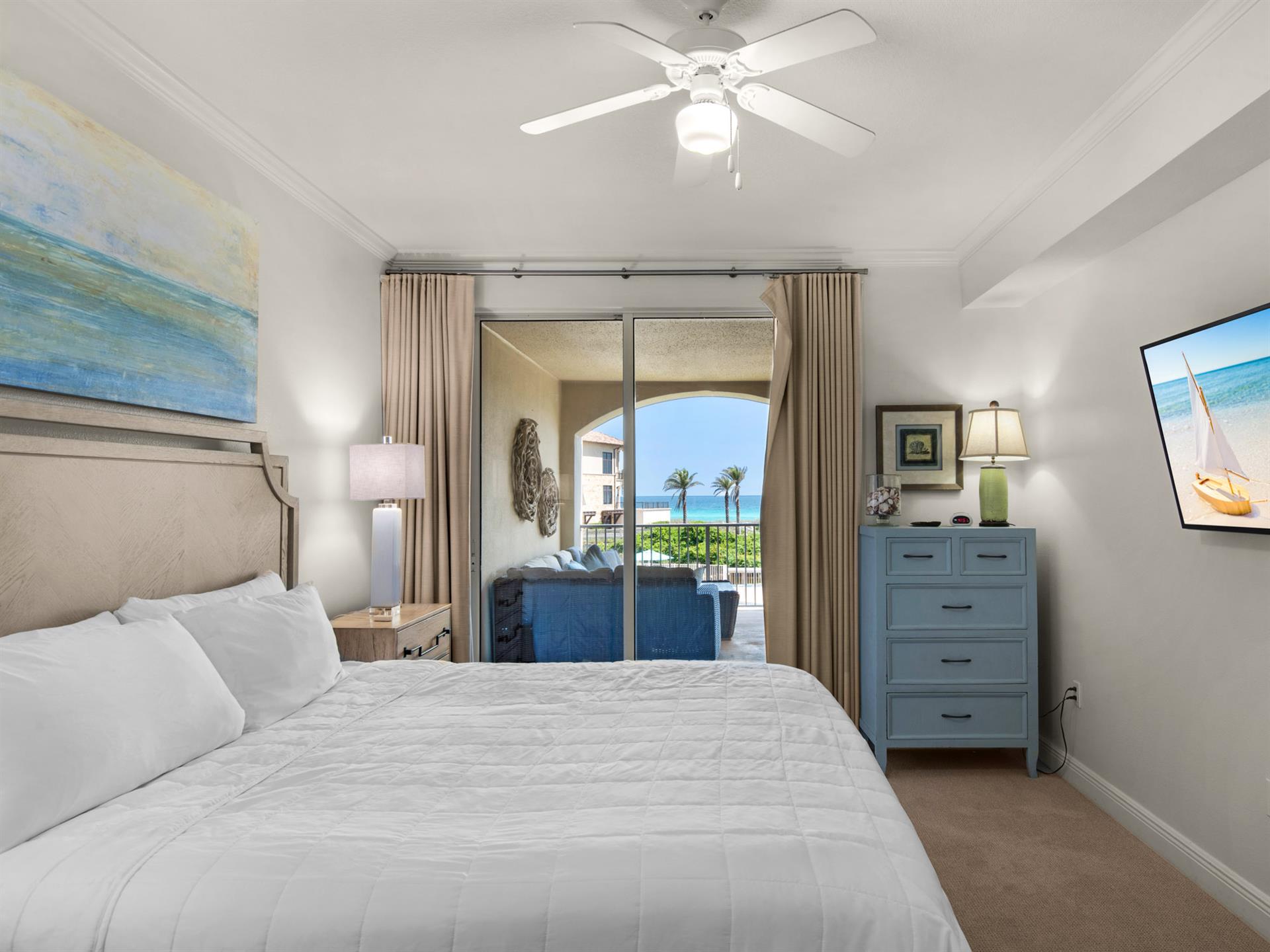 Primary Bedroom with King Bed and Private Balcony Access