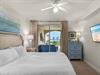 Primary Bedroom with King Bed and Private Balcony Access
