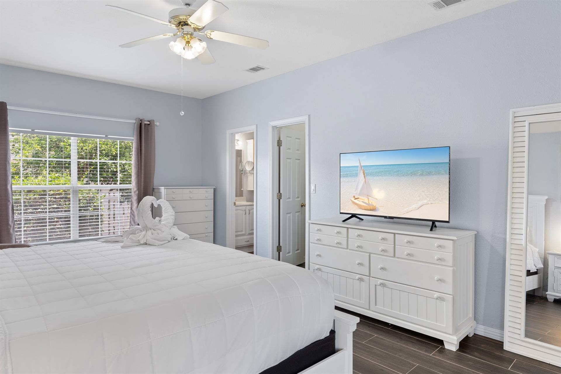 Primary Bedroom with King Bed and Flat Screen TV