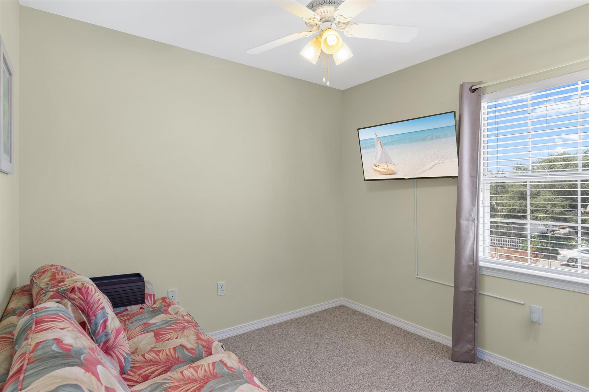 Bedroom 4 with Pull out Sofa and Flat Screen TV in Carriage House