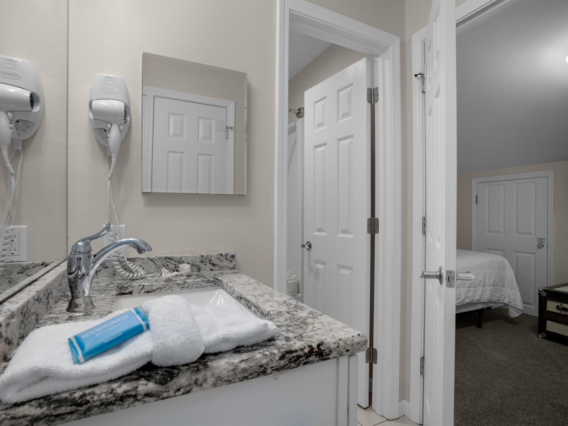 2nd floor LOFT shared bathroom with open vanity area, door for privacy in shower and toilet room