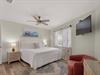Primary Bedroom with King Bed and Flat Screen TV