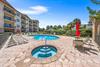 Community Pool and Hot Tub with Plenty of Seating