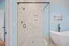 Soaking Tub and WalkIn Shower in Primary Bathroom 7