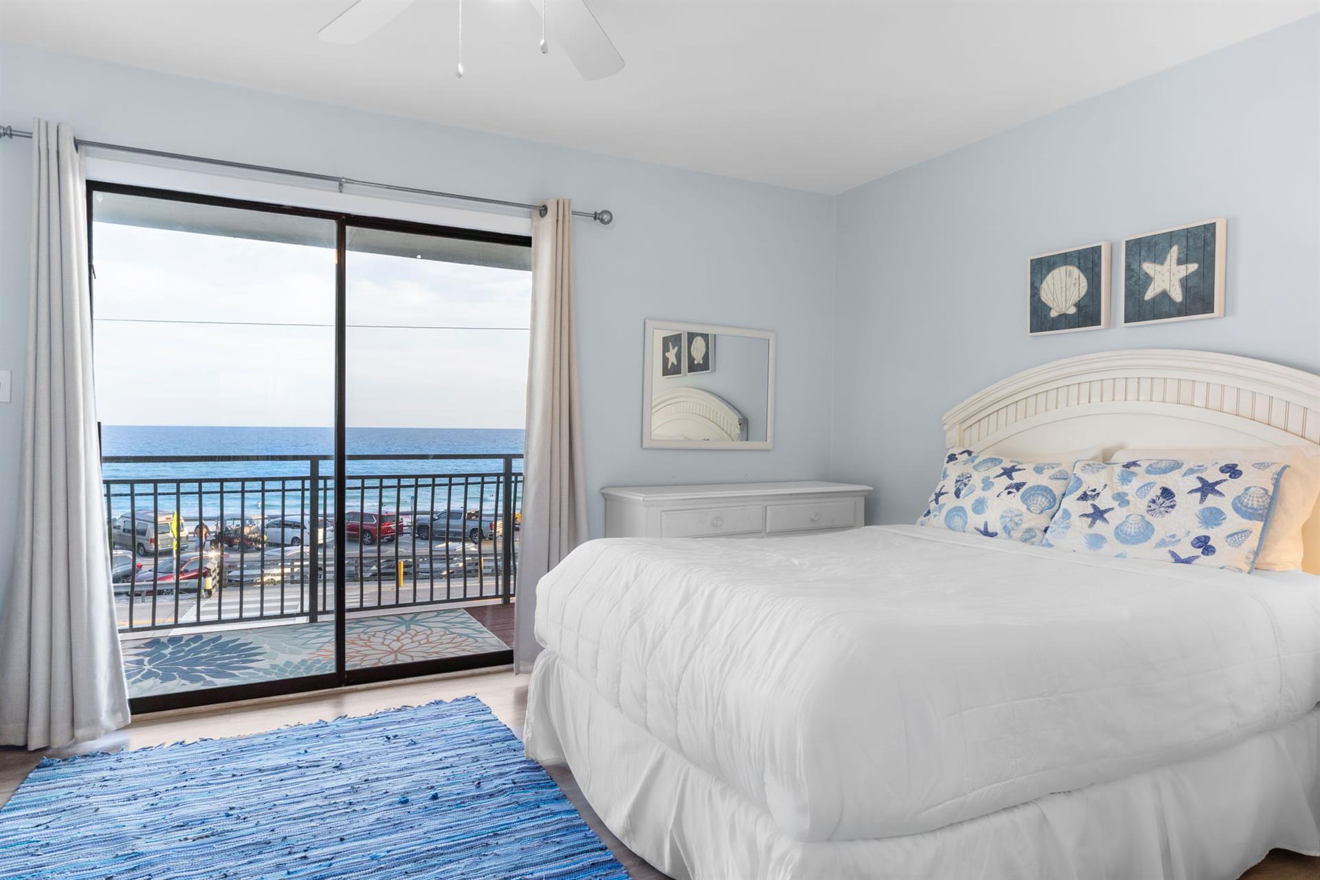 Primary Bedroom 1 on 3rd Fl with Queen Bed and Balcony