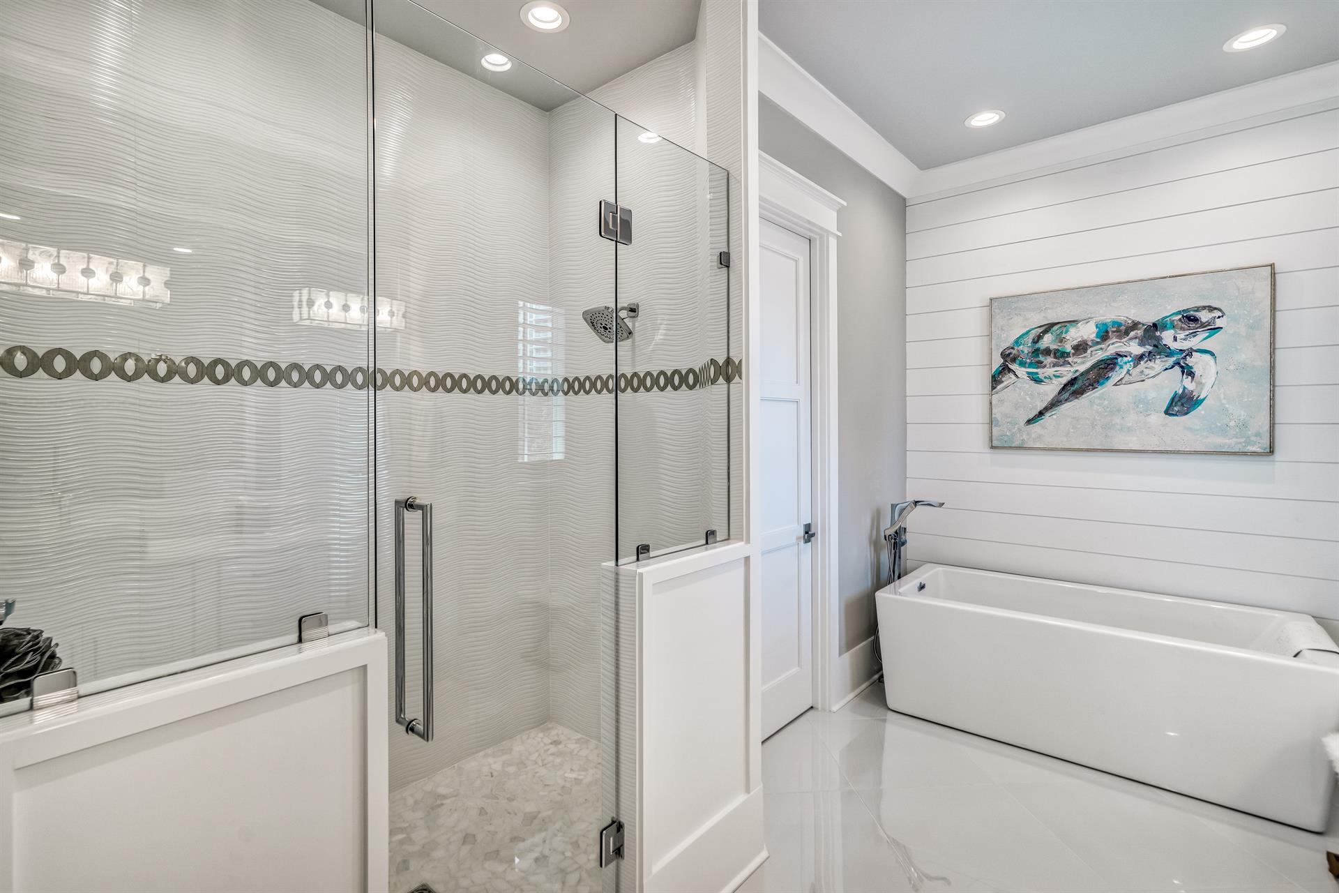 Third floor Master suite bathroom number one soaking tub and shower.