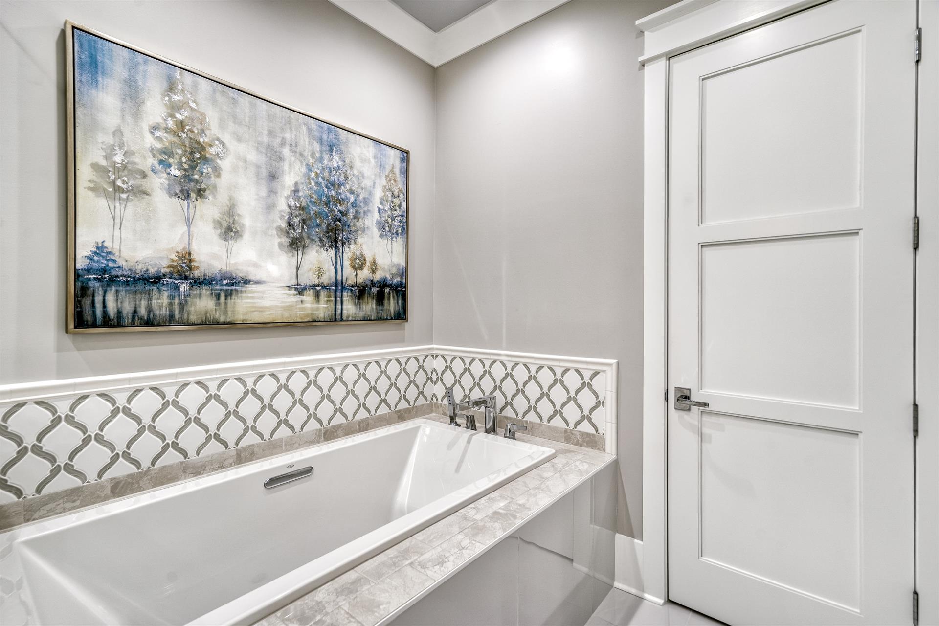 Third floor Master suite number two with soaking tub and shower.