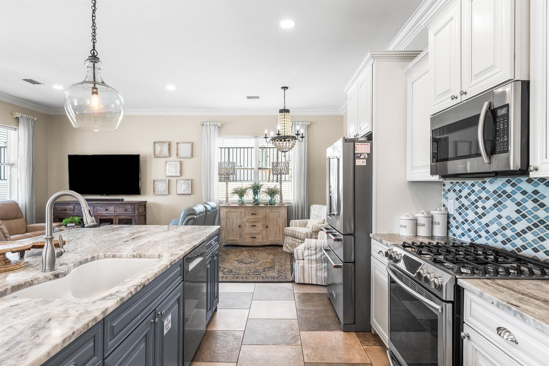 Fully Stocked Kitchen with Stainless Steel Appliances