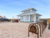 Public beach access with bike rack across the street