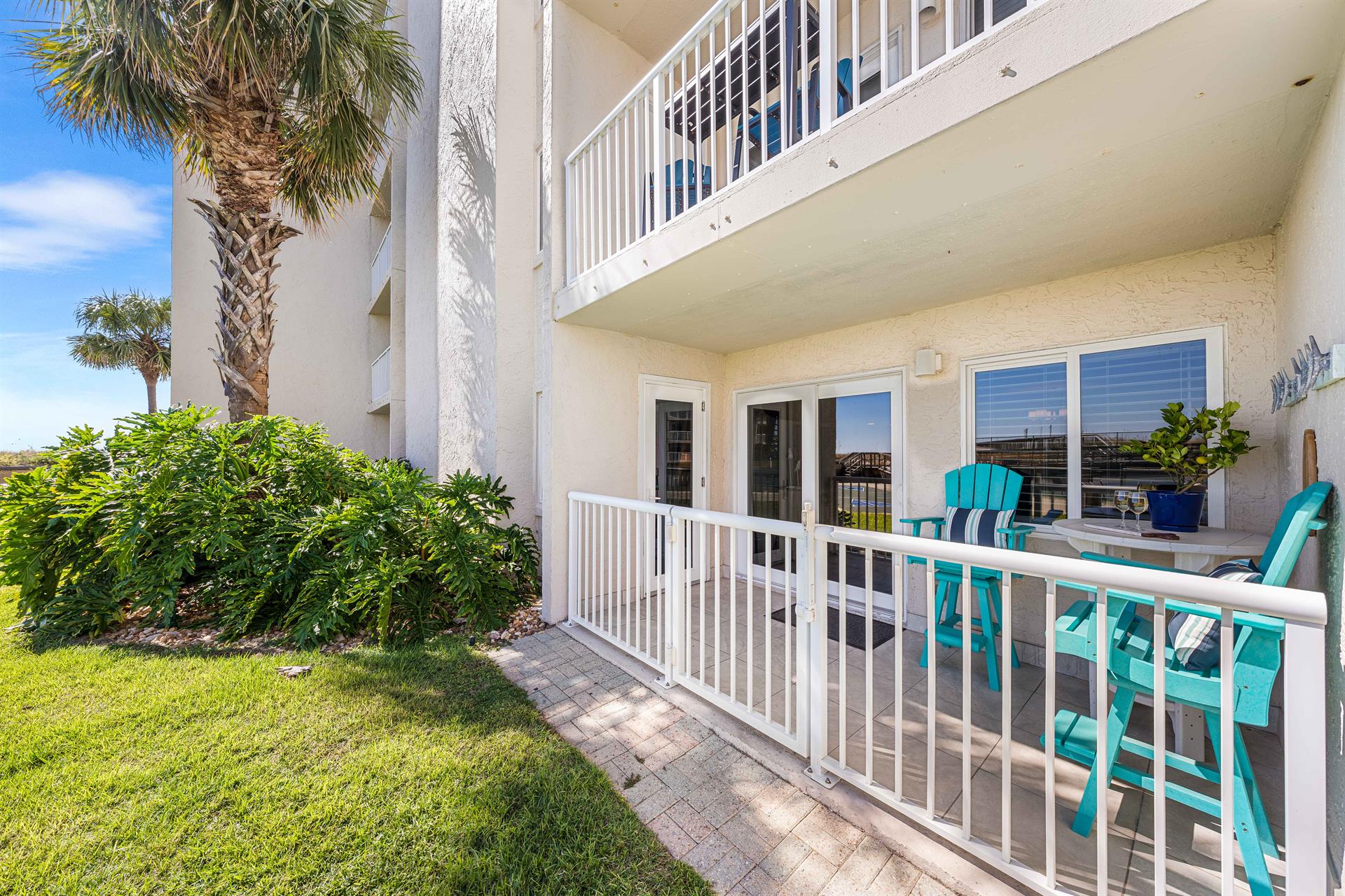 Sunset, sea breeze, and sandy toes just steps away.