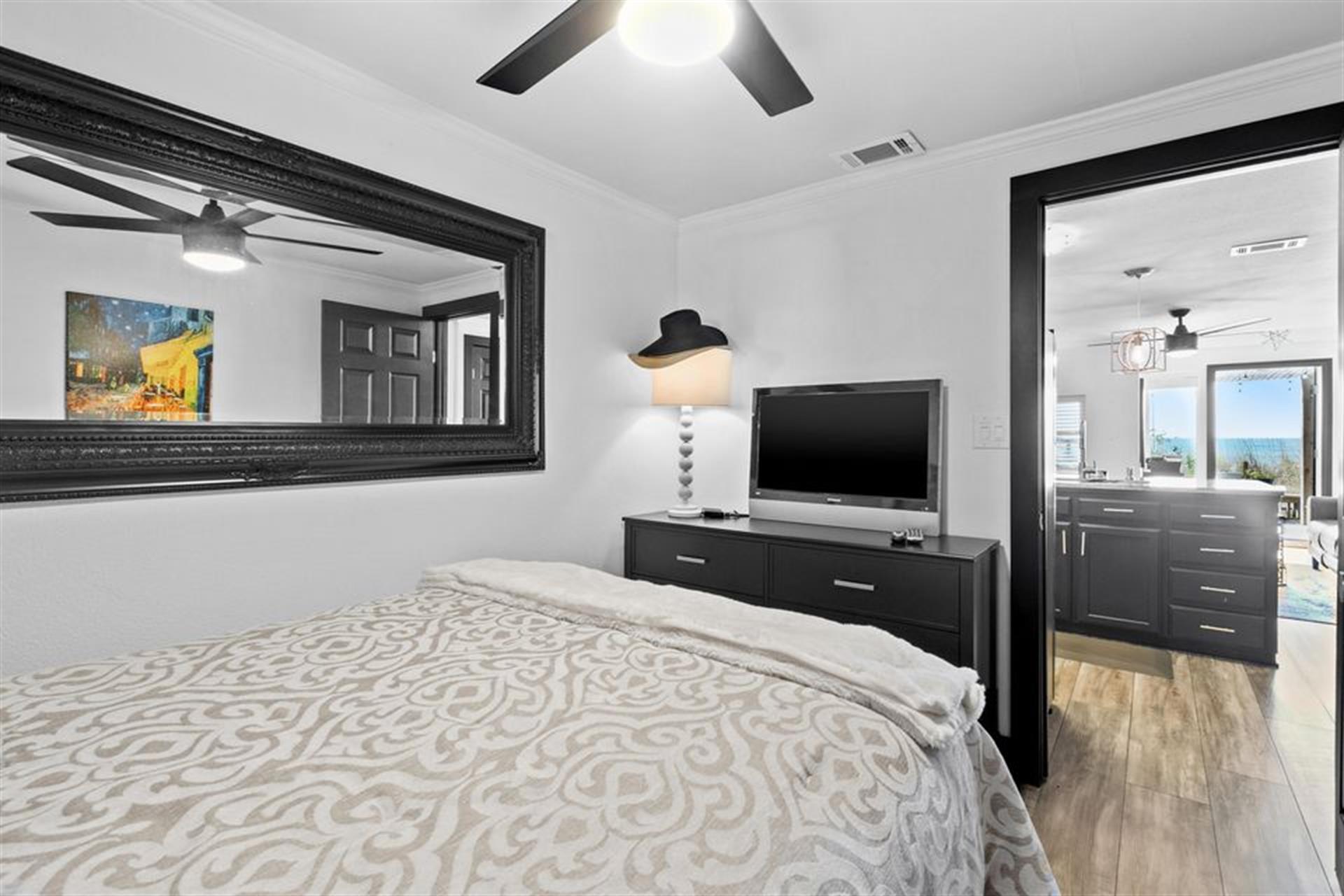 Bedroom 3 on Beach Level with Queen Bed and Flat Screen TV