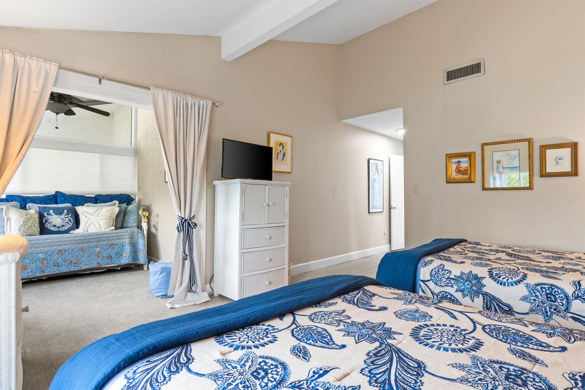 Guest Bedroom with enclosed patio and trundle bed