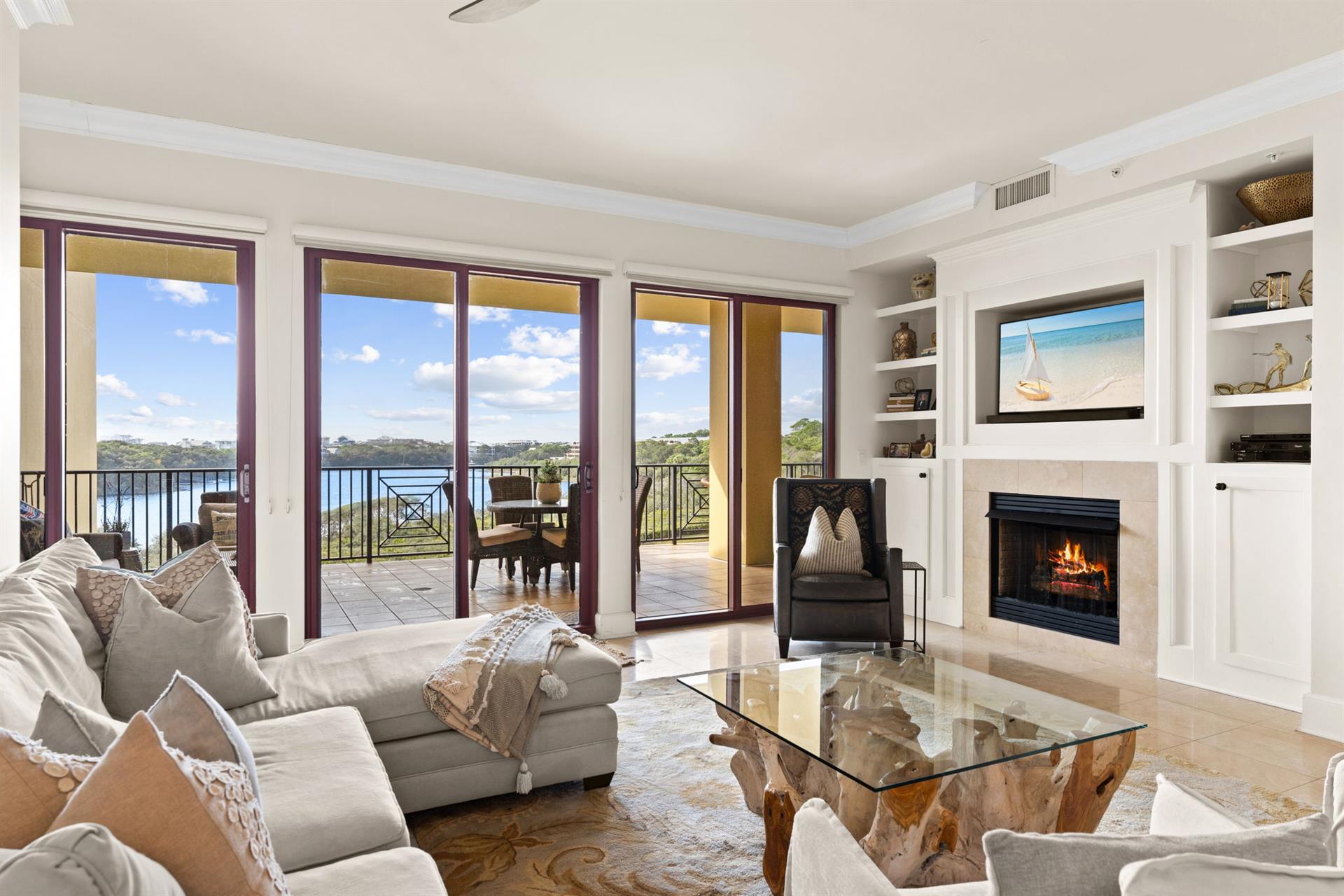 Living Area on 1st Floor with Fireplace and Private Balcony