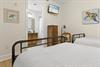 Bedroom 4 on 1st Floor with 2 Double Beds and Flat Screen TV
