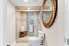 Master bath with walkin shower and bench