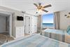 Guest bedroom with beach view and private access to bathroom